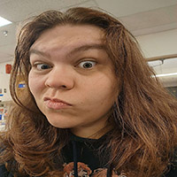 28 year old woman with silly expression